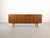 We are offering a beautiful vintage teak sideboard from the 1960s-70s for sale. with three doors and four drawers, this...