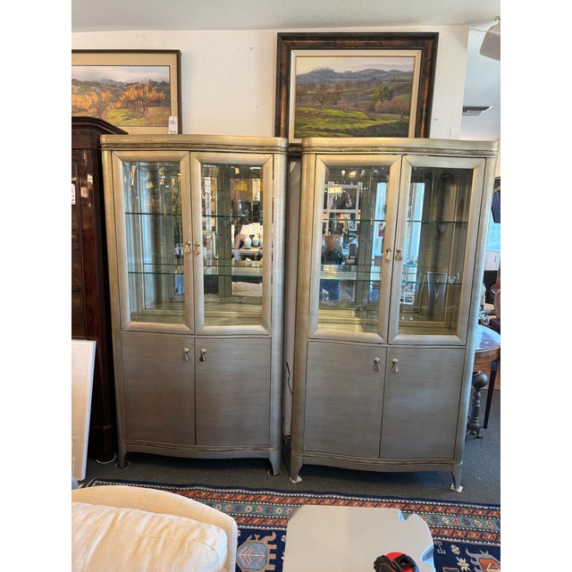 Design Plus Gallery presents a Pair of La Reina Curio Cabinets from the Sofia Vergara Collection. Made with poplar solids...