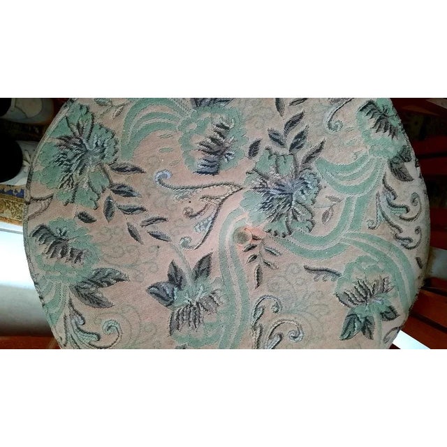 A 1960s stool of teak wood cross section base with velvet upholstery seat. I have official proof of authenticity such as...