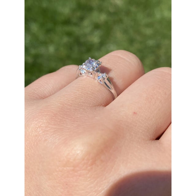 The Guin: Vintage White Gold Promise Ring set with Natural Diamonds. The ring features a central old European cut natural...