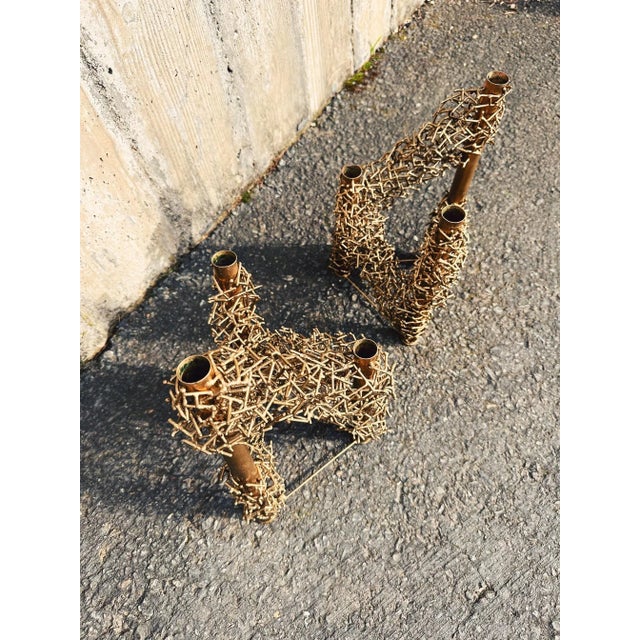 Pair of brutalist style, sculptural tabletop candle holders. Studio pieces; California Circa 1970. Three candleholders per...