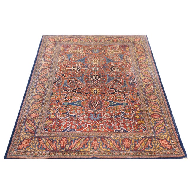 Tehran does Garrus! This central Persian, finely woven urban scatter shows a red field with a forked arabesque design in...