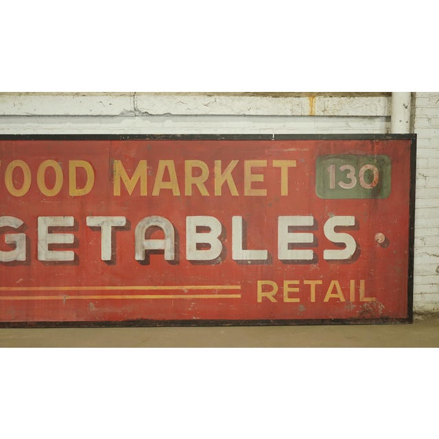 Reclaimed movie set sign made of aluminum in red, yellow, white, green, and black colors. The sign reads "130,...