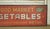 Reclaimed movie set sign made of aluminum in red, yellow, white, green, and black colors. The sign reads "130,...
