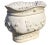 A stately pair of Italian Marble rose jardiniere urn planters. Each massive pot is beautifully decorated with a rose and...