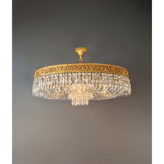 An elegant oval flush mount chandelier with balanced proportions and a refined presence. Fully restored in our Berlin...