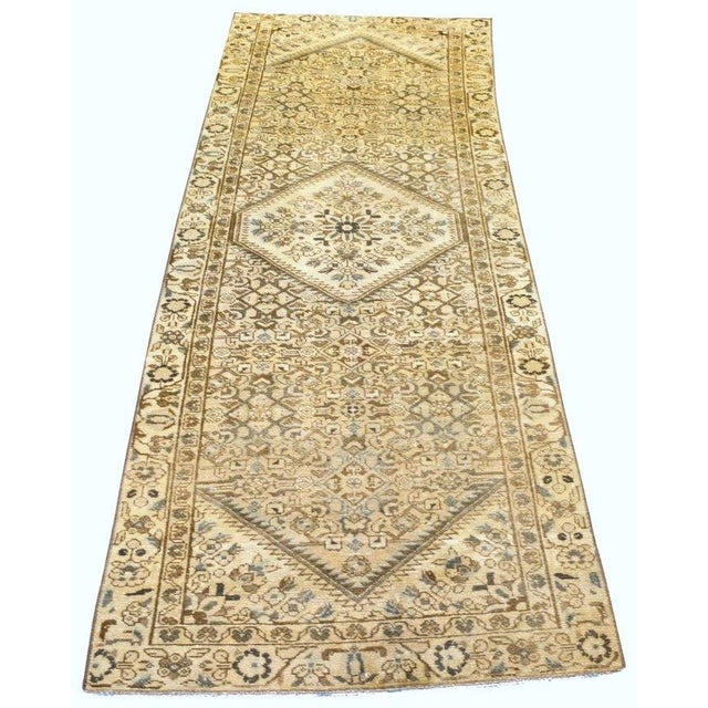 Hand-knotted with care using traditional rug-making techniques, this wool rug blends timeless craftsmanship with a modern...