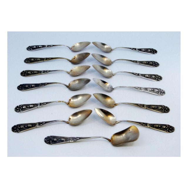 Coffee Spoons with Sugar Shovel in Embossed Silver with Floral Motifs, Set of 12, in Very Good conditions. Designed 1890...