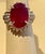 Oval 12 Carat Treated Ruby and 1 Carat Diamond 14 Karat Yellow Gold Ring For Sale - Image 12 of 18