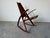 An exceptional 1973 studio-crafted rocking chair by California designer Leon Meyer, showcasing a striking sculptural...