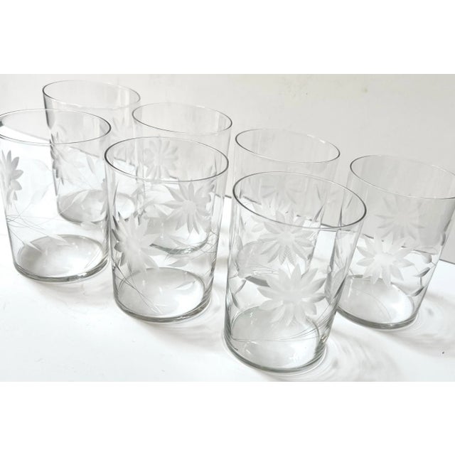 Vintage floral etched glass tumblers, set of 7, featuring delicate patterning ideal for juice, cocktails, or everyday...