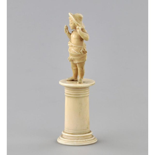 Carved Ivory Figurine of Boy with Bird, 1800s For Sale - Image 4 of 7