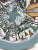 One-of-a-kind hand-painted folk art turntable or lazy Susan featuring a panoramic snowy village scene wrapped around the...