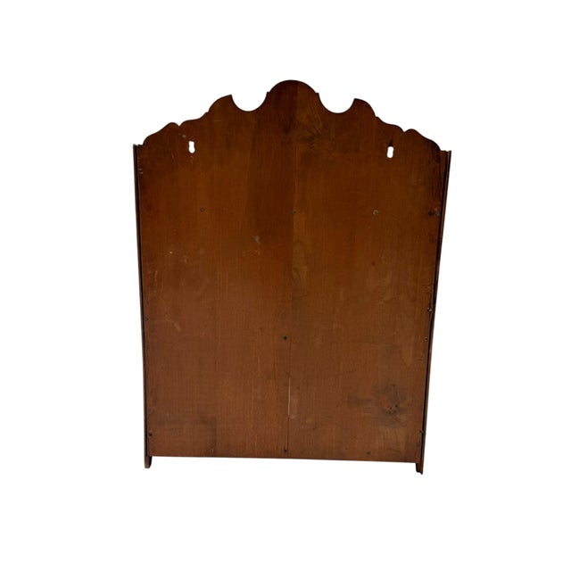 Magnificent and rare Aesthetic Movement wall cabinet. Striking English design from the 1890s. Solid walnut frame with...