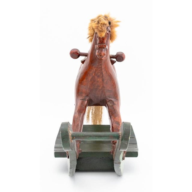 Group of Two Folk Art Painted Wood Horse Toys, comprising: pull horse, 1983, one mounted on rectangular base and four...