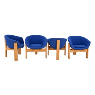 Set of Four Scandinavian Modern Blue Upholstered Tub Chairs With Oak Tripod Bases For Sale