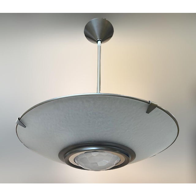 Italian modern pendant chandelier with sanded textured glass panel and central frosted faceted glass diffuser mounted on...