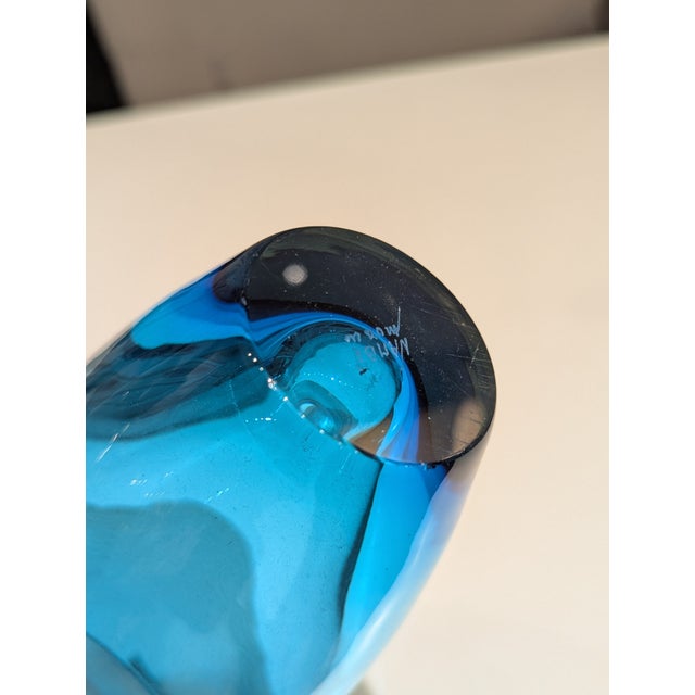 Modern studio glass vessel in translucent turquoise with etched central band and polished metal rim. Sculptural, unmarked,...