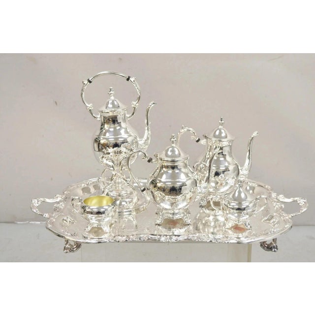 Vintage FB Rogers Victorian Silver Plated Tea Set with Tilting Pot - 6 Pc Set. Circa Mid 20th Century. Measurements: Tray:...