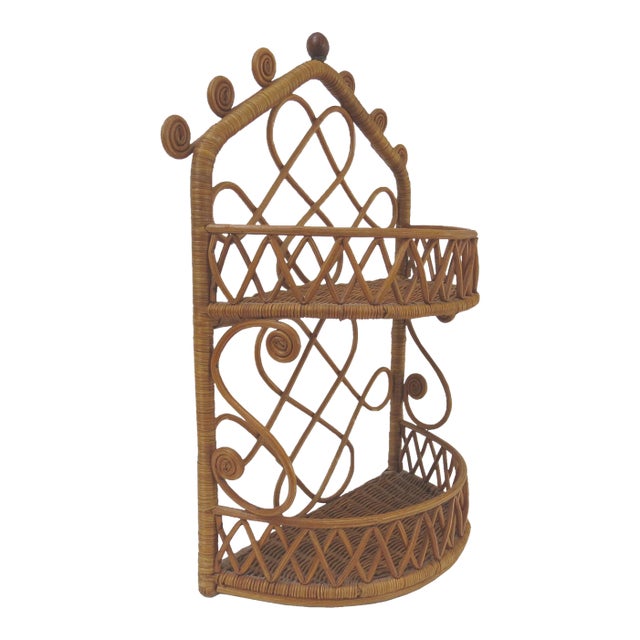 Early 20th Century Rattan Wall Hanging Shelf With Fiddlehead Accents Attributed to Heywood Bros For Sale