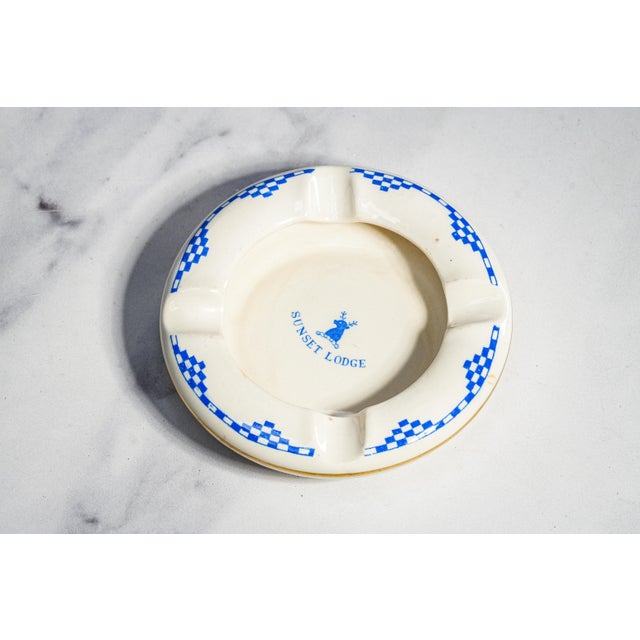 A charming and highly collectible vintage English ceramic ashtray produced by Dunn Bennett & Co. Ltd. of Burslem,...