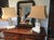 A luminous and soothing presence. This superb pair of table lamps features a seated Buddha in a meditative pose, sculpted...