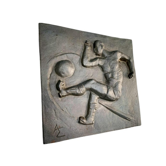 A cast-iron Art Deco modernist wall relief by Allan Ebeling (1897–1975), dating to the 1930s and depicting a dynamic...
