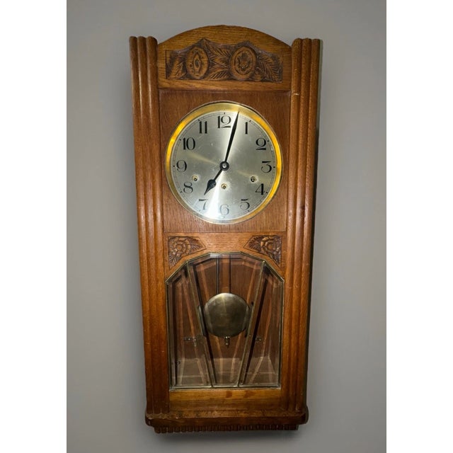 This listing is for an antique German box regulator wall clock. This clock has a nice art deco style case with a metal...