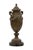 A refined mid-century Hollywood Regency–style bronze lidded urn, inspired by classical French design. This decorative...