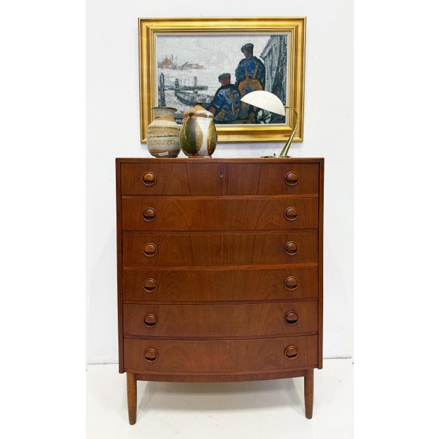 Mid-century Danish Modern Teak Curved Chest of Drawers, Kai Kristiansen Style Offered for sale is a vintage Mid-century...