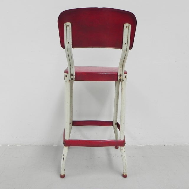 Height: 91 cm. Width: 39 cm. Depth: 34 cm. Seat height: 62 cm. Origin: USA, 1950s. Material: steel.