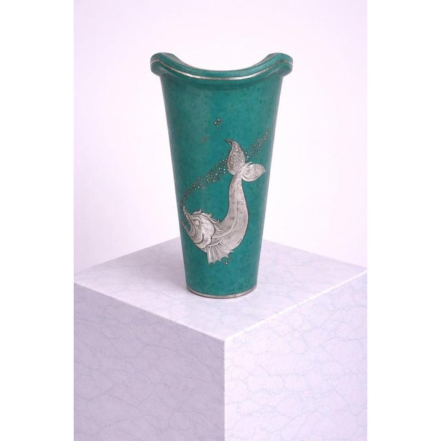 A refined and highly collectible Argenta vase designed by Wilhelm Kåge for Gustavsberg, Sweden, dating to the 1940s. This...