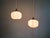 Pair of Art Deco pendant lights in pink marbled opaline glass, 1920s-30s. Each pendant light has been restored and...
