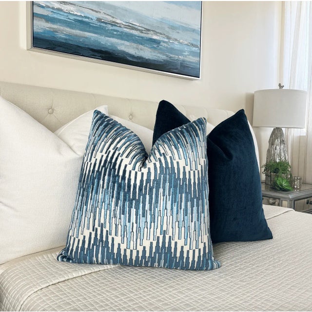 This blue and cream modern abstract zigzag pillow has it all, beauty, softness, and functionality. The alternative zigzag...