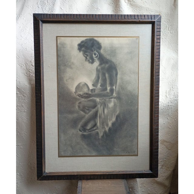 This striking mid-century monochrome drawing executed in charcoal or rich pastel features a kneeling or crouching figure...