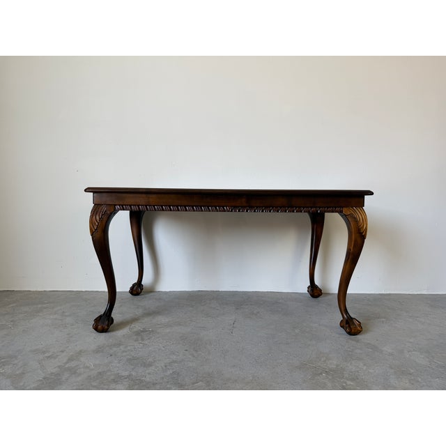 Elegant vintage coffee table crafted in the style of Georgian, showcasing refined traditional craftsmanship and timeless...