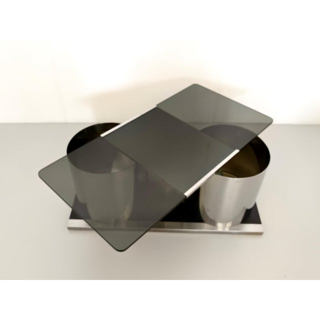Made in Italy, 1970s. This is an elegant coffee table or bar with a high-quality rectangular tempered smoked glass top...