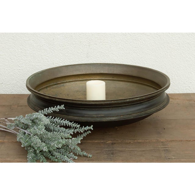 This 22.5-inch Urli is an authentic piece of Southern Indian heritage, hand-cast using the traditional lost-wax method in...