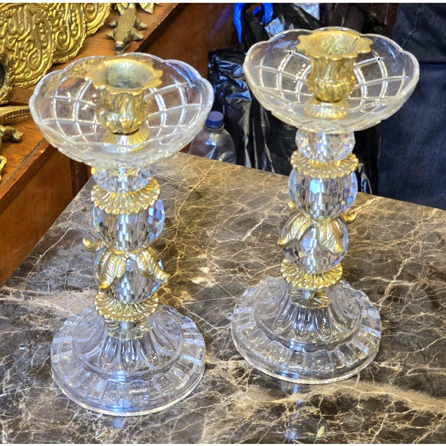 Designed for spaces that value detail and balance, this brass and crystal candlestick holder brings understated elegance...