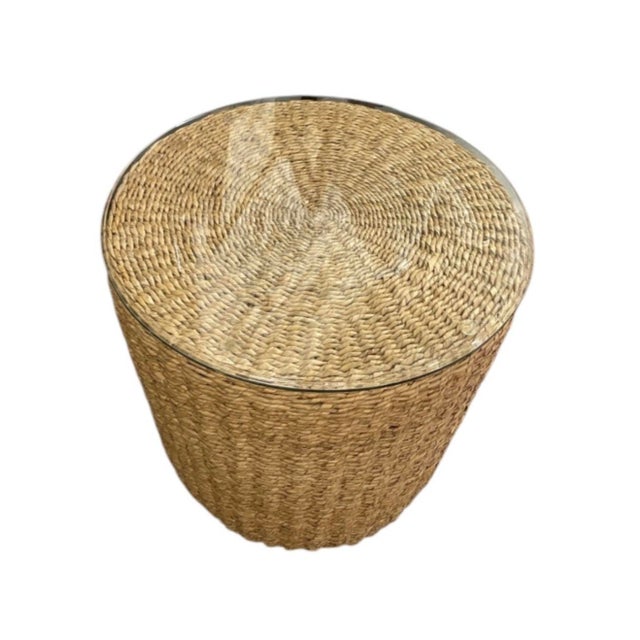 Bring organic texture and effortless coastal charm to your home with this handcrafted drum side table. Expertly woven from...