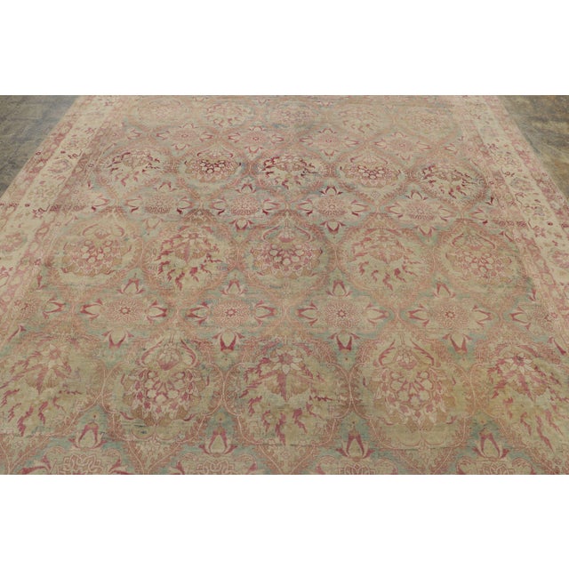 This 9x13 antique Persian Kerman rug, circa 1900–1920, is a distinguished addition to Rug & Kilim’s antique collection,...