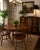 Charming vintage dining chair set by Virginia House, crafted from solid oak with a warm medium-brown finish that...
