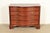 An exceptional Georgian or Chippendale style serpentine front dresser or chest of drawers By Baker Furniture, "Historic...
