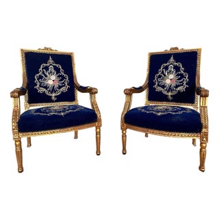 Mid 20th Century French Louis XVI Style Giltwood & Navy Embroidered Velvet Fauteuils- Pair For Sale