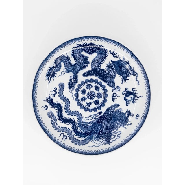 Crafted in Bát Tràng, Vietnam, a village celebrated for centuries of ceramic artistry, this pedestal serving dish is hand-...