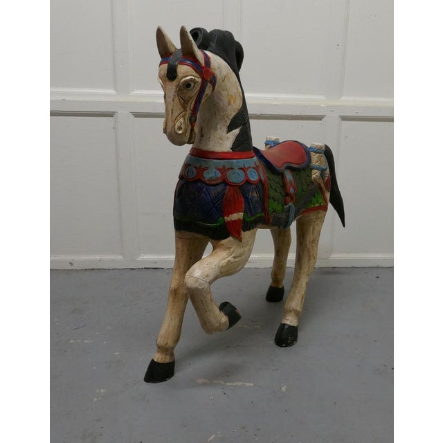 19th century carved and painted wooden horse. This is a superb piece of Folk Art, superbly carved in wood, the paint is...