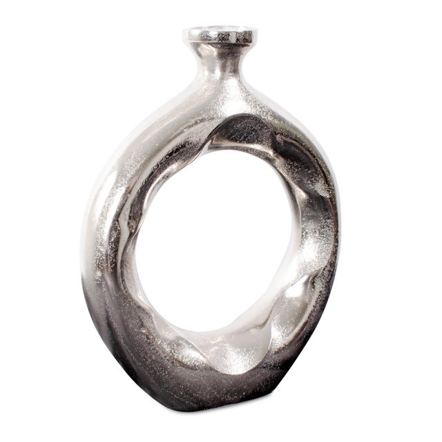 Constructed from cast aluminum and hand-finished, the Paradox Vase has a sleek silver color palette. The textured and...