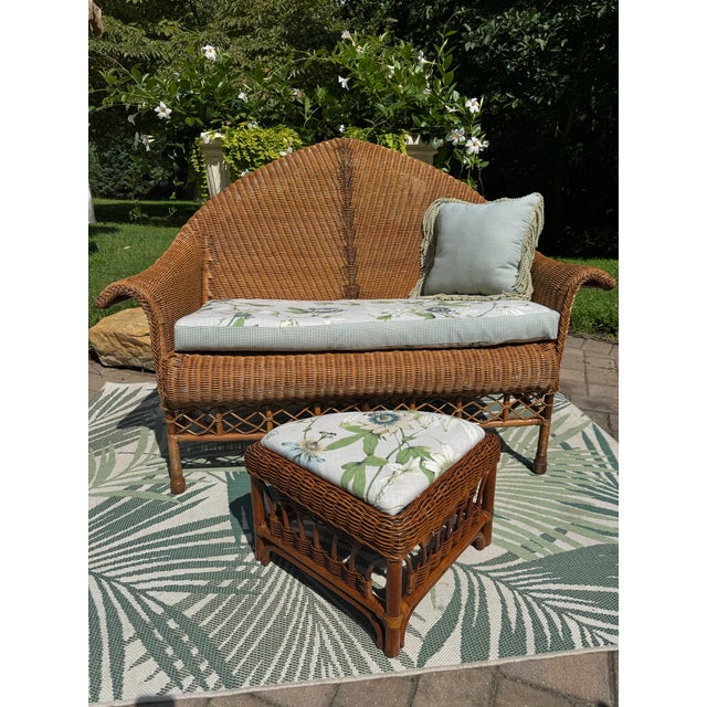 Rare Vintage wicker settee with cathedral back, intricate rattan work, sculptural arms, beautifully turned rattan lattice...