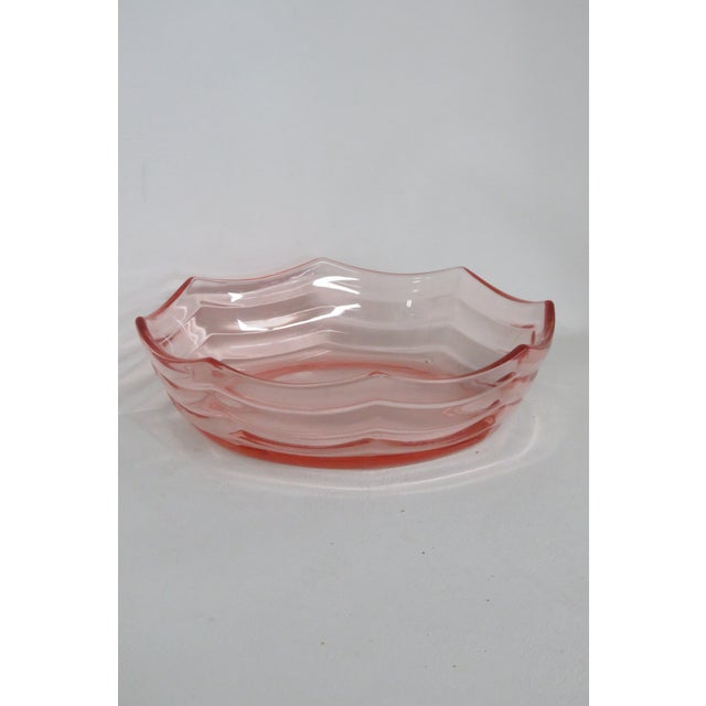 This beautiful Bowl is made out of depression glass. The Serving Bowl has beautiful style with a lovely light pink color...