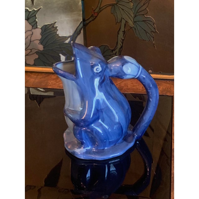 Offering a charming smaller scale blue and white ceramic pitcher - a frog on a lily pad in excellent condition.